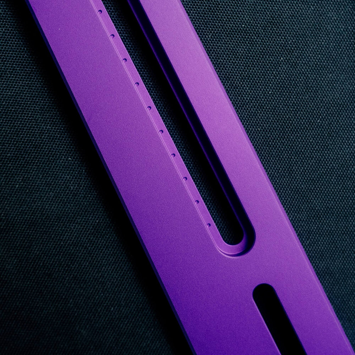 Spectral Purple SPEC 282 plate, sandblasted matte anodized, with a CNC-marked adjustment slot